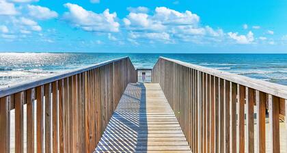 Gulf-view condo in beachfront complex with balcony, pool, hot tub, & central AC