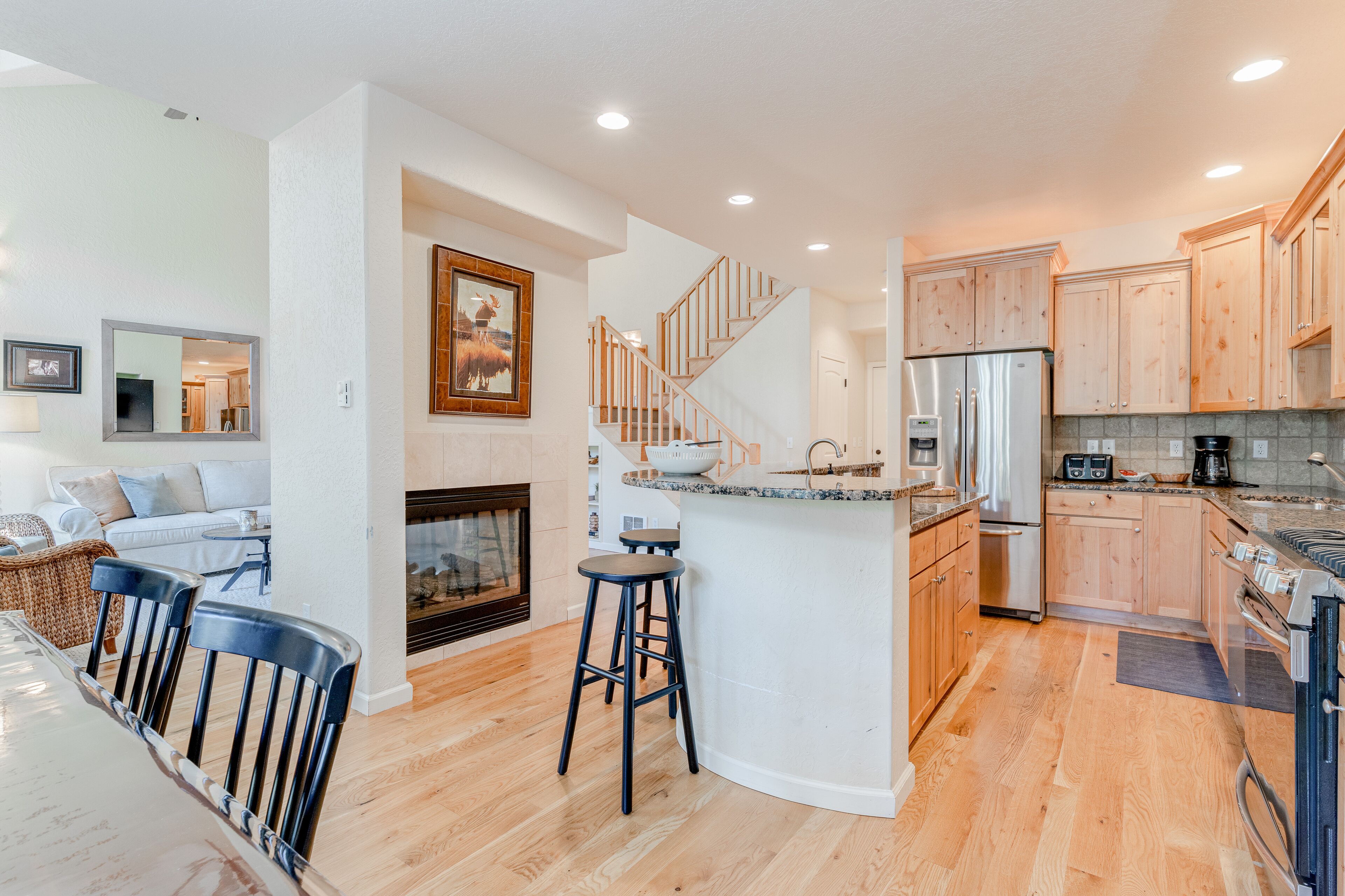 Modern home with a gas fireplace, jetted tub, spacious deck, & washer/dryer