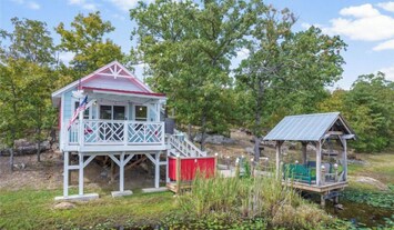 Image of Cozy Cabin, firepit, with 10 acres to roam, private pond and Dock, s’more’s