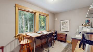 Fridge, microwave, coffee/tea maker, cookware/dishes/utensils