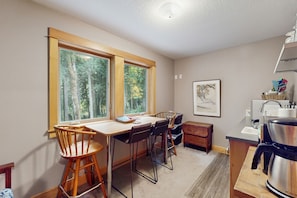 Fridge, microwave, coffee/tea maker, cookware/dishes/utensils