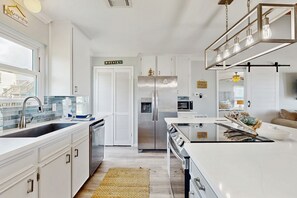 Fridge, microwave, oven, stovetop - Beachfront home with panoramic Gulf views - steps to beach & minutes to town (Galveston)