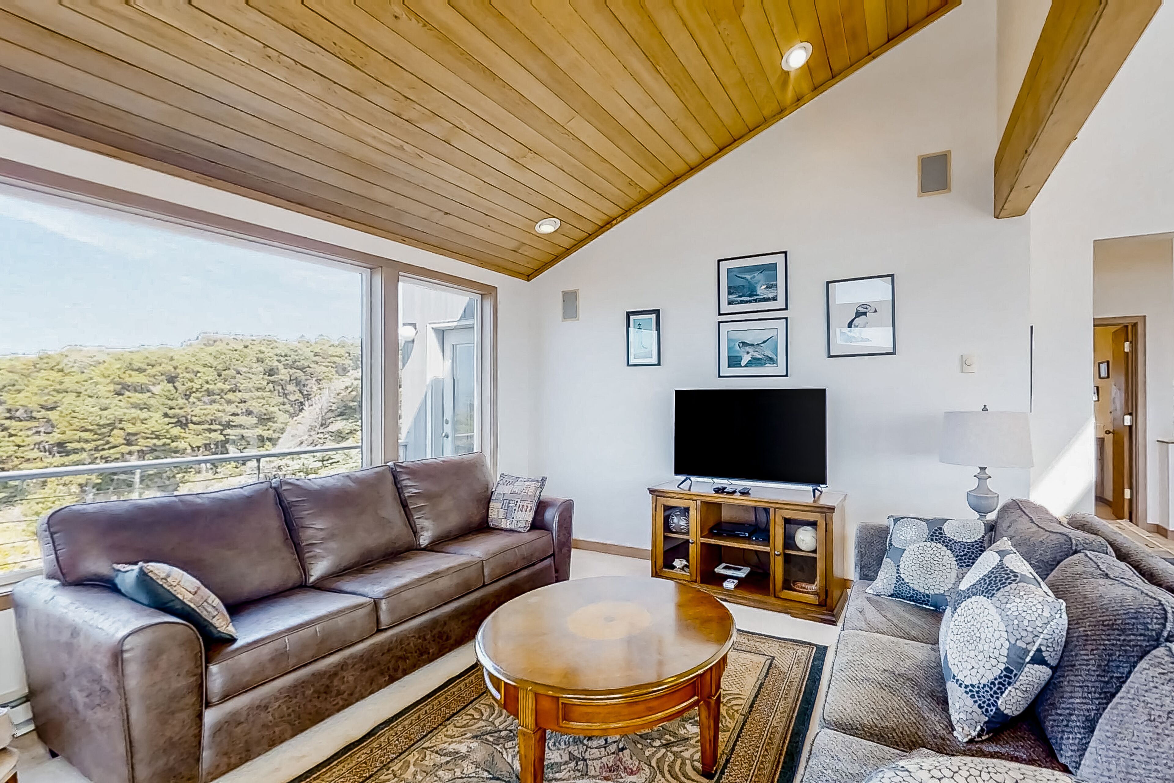 Spacious oceanfront home with free WiFi, fireplace, and wrap-around deck