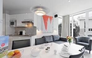 Departamento (Dünenvilla Deluxe) | Sala de estar | Televisión 