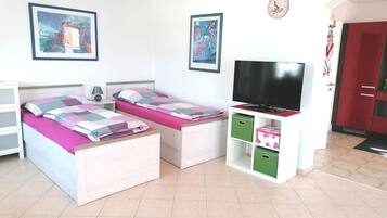 1 chambre, fer et planche Ă repasser, Wi-Fi, draps fournis