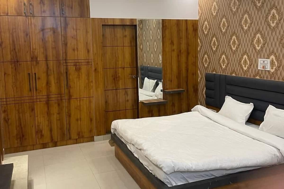 Chambre Deluxe Double ou avec lits jumeaux | Draps fournis