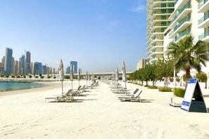 On the beach, sun loungers