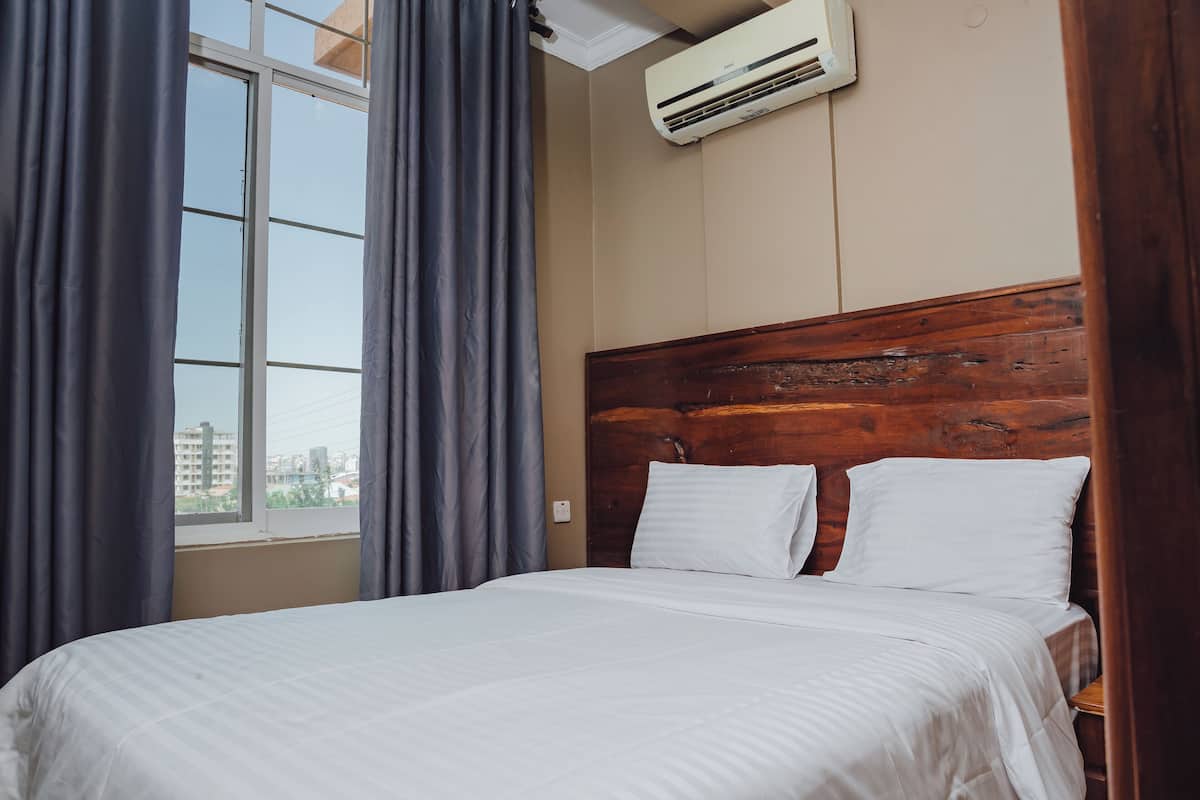 Quarto luxo | Cortinas blackout, quartos à prova de som, ferros/tábuas de passar roupa