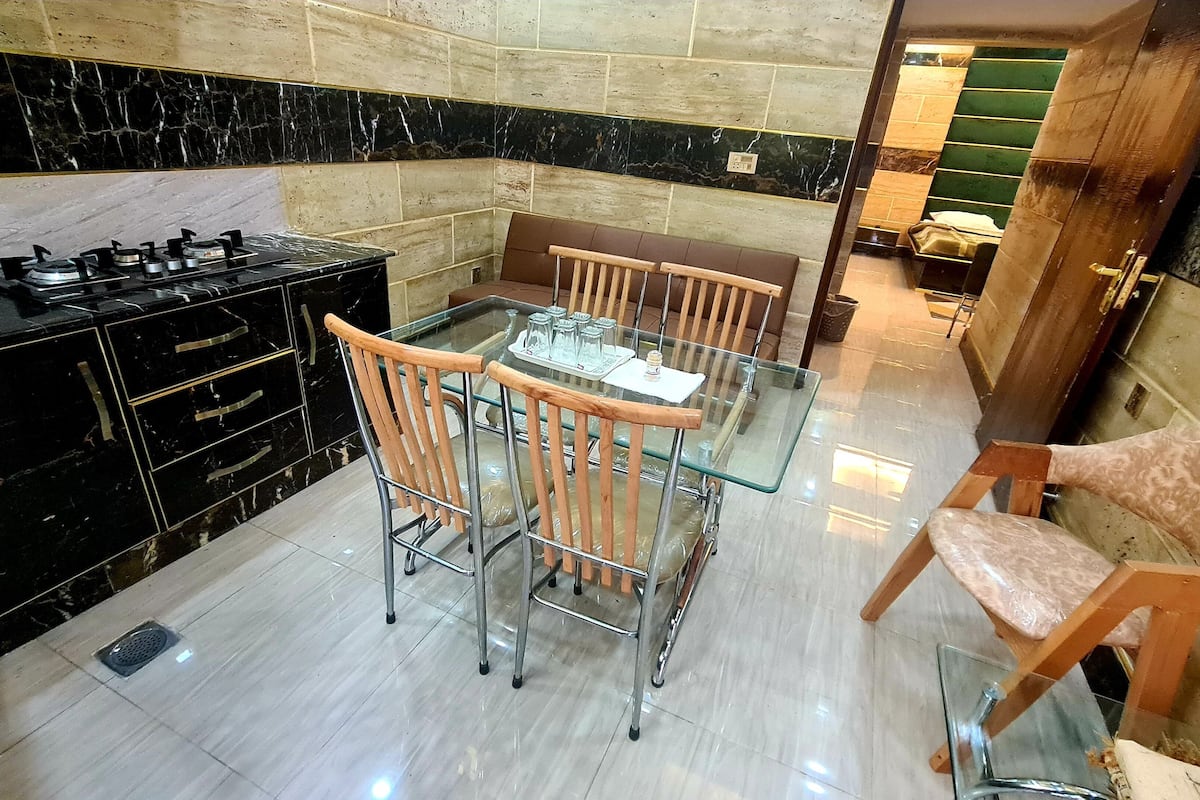 deluxe apartment, 1 bedroom | living area | lcd tv