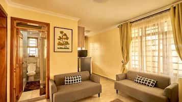 Deluxe House | Living area | LED TV