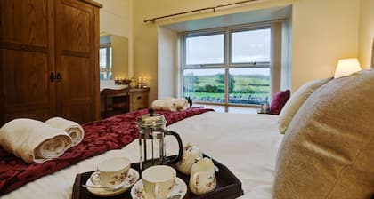 The Old Dairy - a coastal that sleeps 2 guests in 1 bedroom