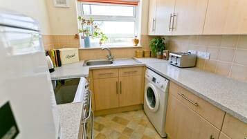 Refrigerador, microondas, horno y lavavajillas