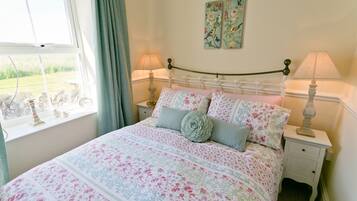 2 habitaciones, tabla de planchar con plancha y cuna de viaje