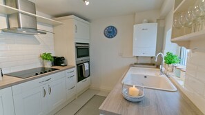 Fridge, oven, coffee/tea maker, high chair