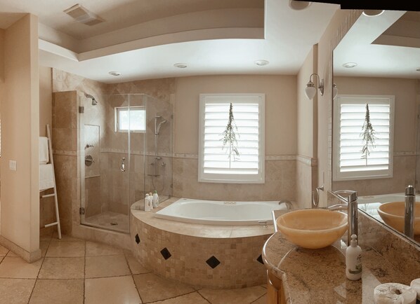 Combined shower/tub, hair dryer, towels, soap