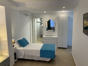 Blue Capri | Blackout drapes, free WiFi, bed sheets