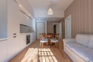 Living area - GuestHost - Modern central apartment a short distance from Piazza Santo Stefano located on the first floor with a furnished terrace of about 40 square meters. Able to accommodate 4 people, ideal for those who want to visit Bologna and its surroundings or (Bologna)
