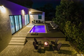 Outdoor pool, a heated pool - THE OASIS, Brand New Home, Screened in Heated Pool, Close to 5th Ave and Beach (Naples)