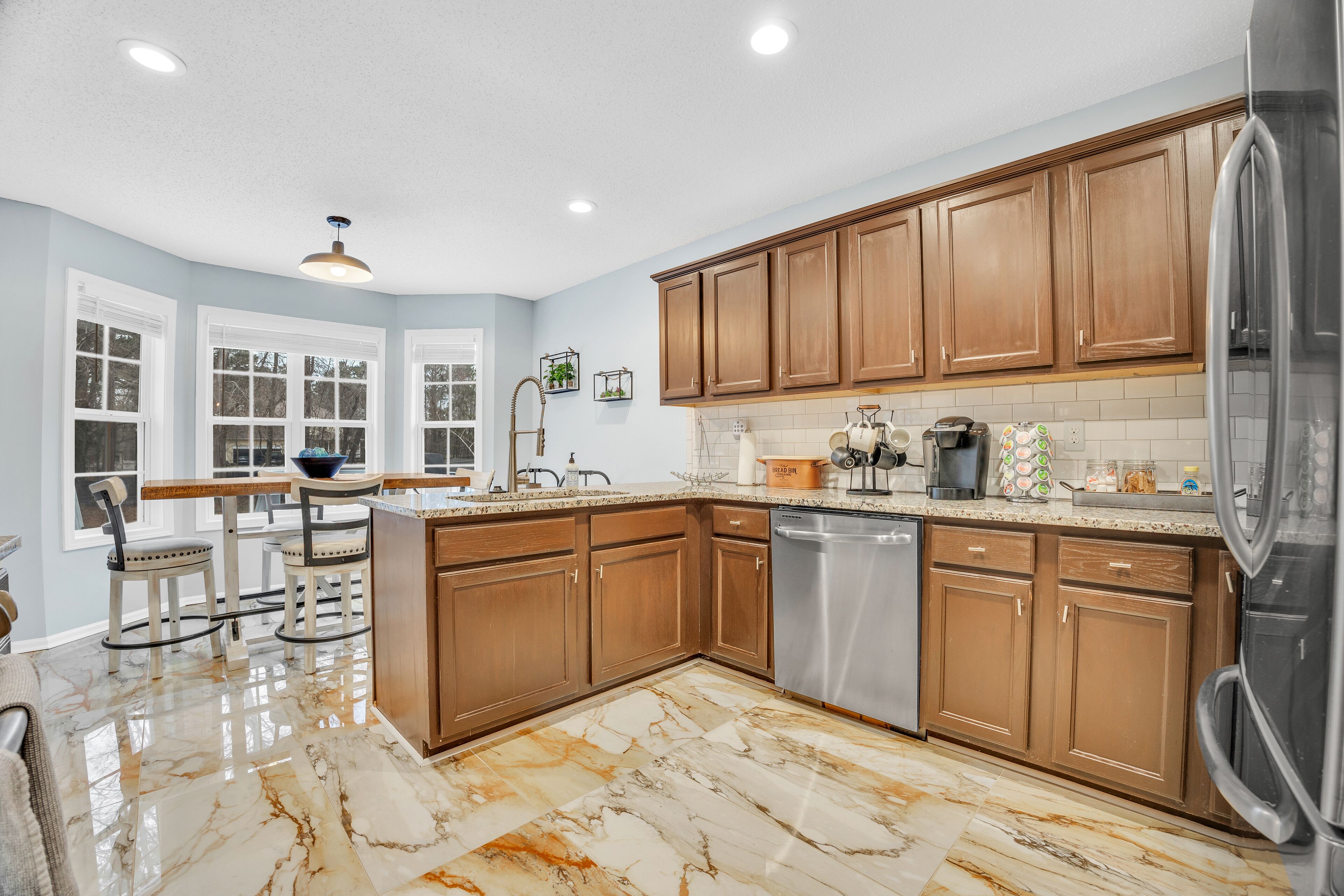 Large 5 bedroom home with fenced yard and custom fire pit