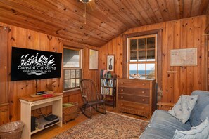 TV, fireplace - Fred Wood Cottage:Oceanfront, historic, Old Nags Head Style cottage, wide decks! (Nags Head)