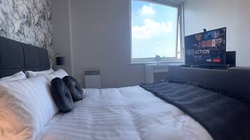 2 chambres, fer et planche à repasser, accès au Wi-Fi (inclus)