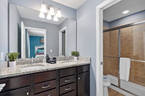 Bathtub, hair dryer, towels
