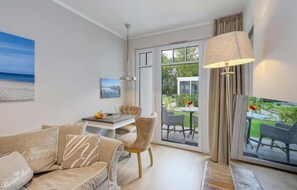 Apartamento | Sala de estar | Una Smart TV