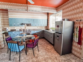 Fridge, microwave, cleaning supplies