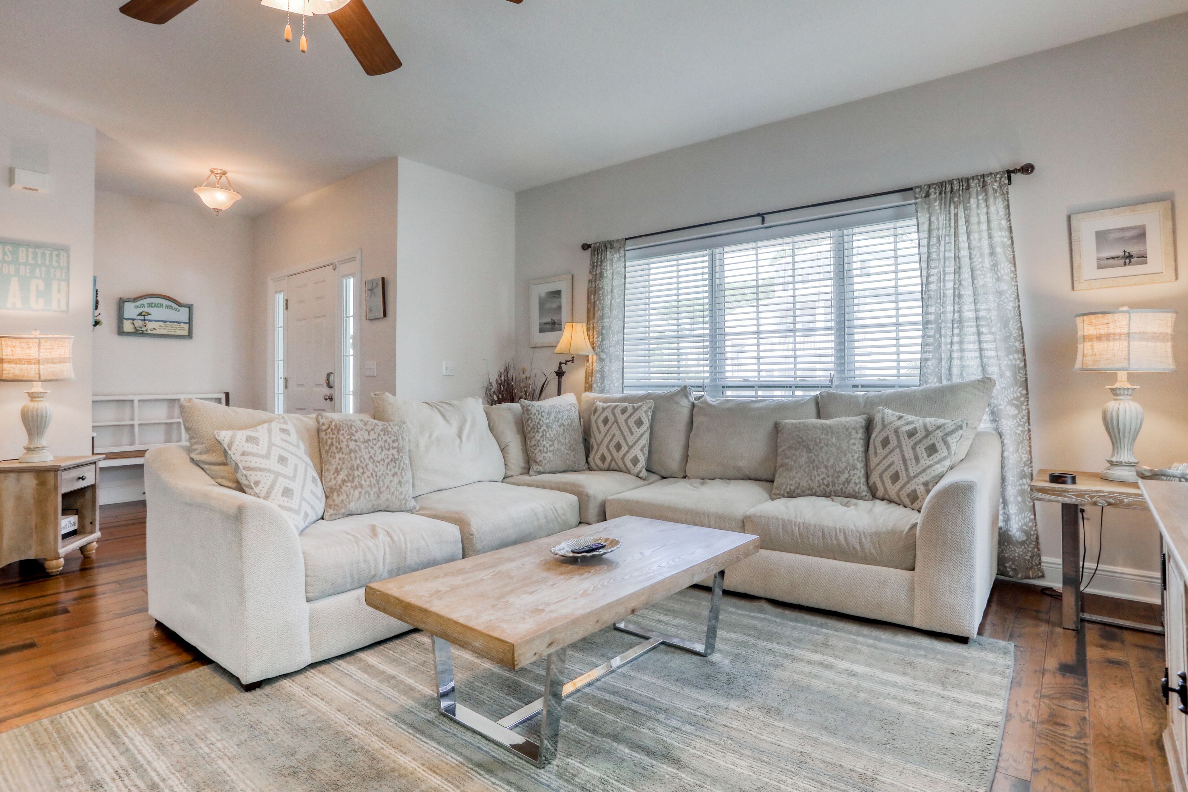 Coastal retreat with pool, hot tub, golf cart, patio, grill, & air hockey