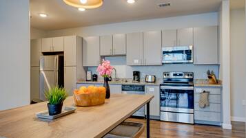 Condo, 3 Bedrooms | Private kitchen | Full-size fridge, oven, stovetop, dishwasher