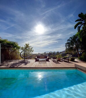 Outdoor pool, open 8:00 AM to midnight, free pool cabanas