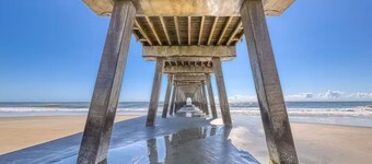 Charming, immaculate coastal home with furnished porches, AC, & washer/dryer