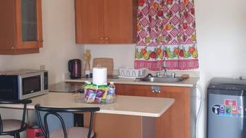 Fridge, microwave, stovetop, electric kettle