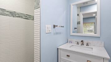 Bathtub, hair dryer, towels