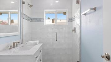 Bathtub, hair dryer, towels