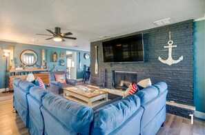 Smart TV, fireplace, table tennis, books