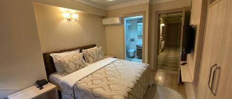 Chambre Standard double | Draps en coton égyptien, literie de qualité, minibar, coffre-fort