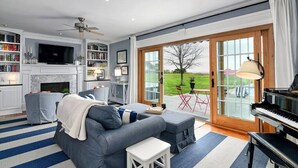 TV, offices - Waterfront Home with Pool, Hot Tub, Dock & Sunset Views – Near St. Michaels (Tilghman Island)