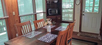 Authentic log cabin nestled in the woods by creek