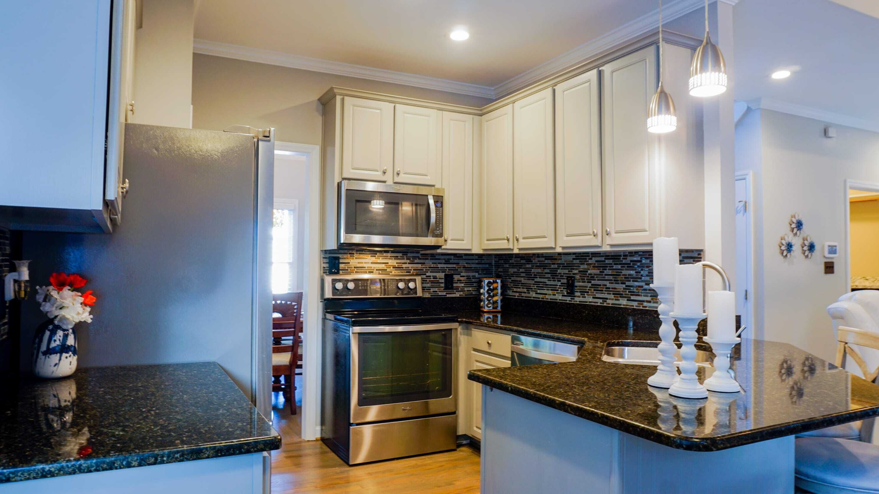 Hot Tub, Game Room, Theater Room & Fenced In Yard!