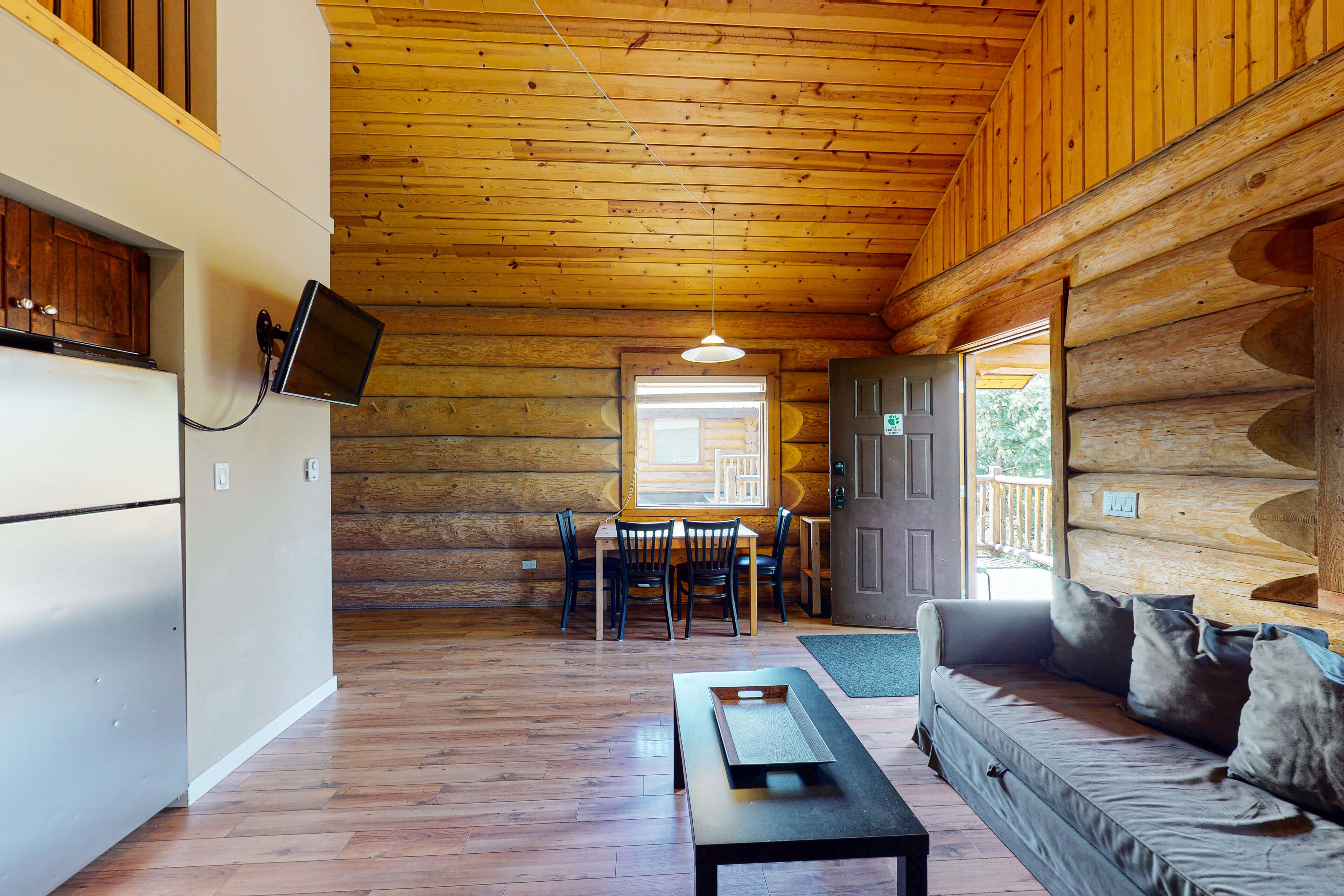 Dog-friendly lakefront wilderness resort cabin with deck, WiFi, & full kitchen