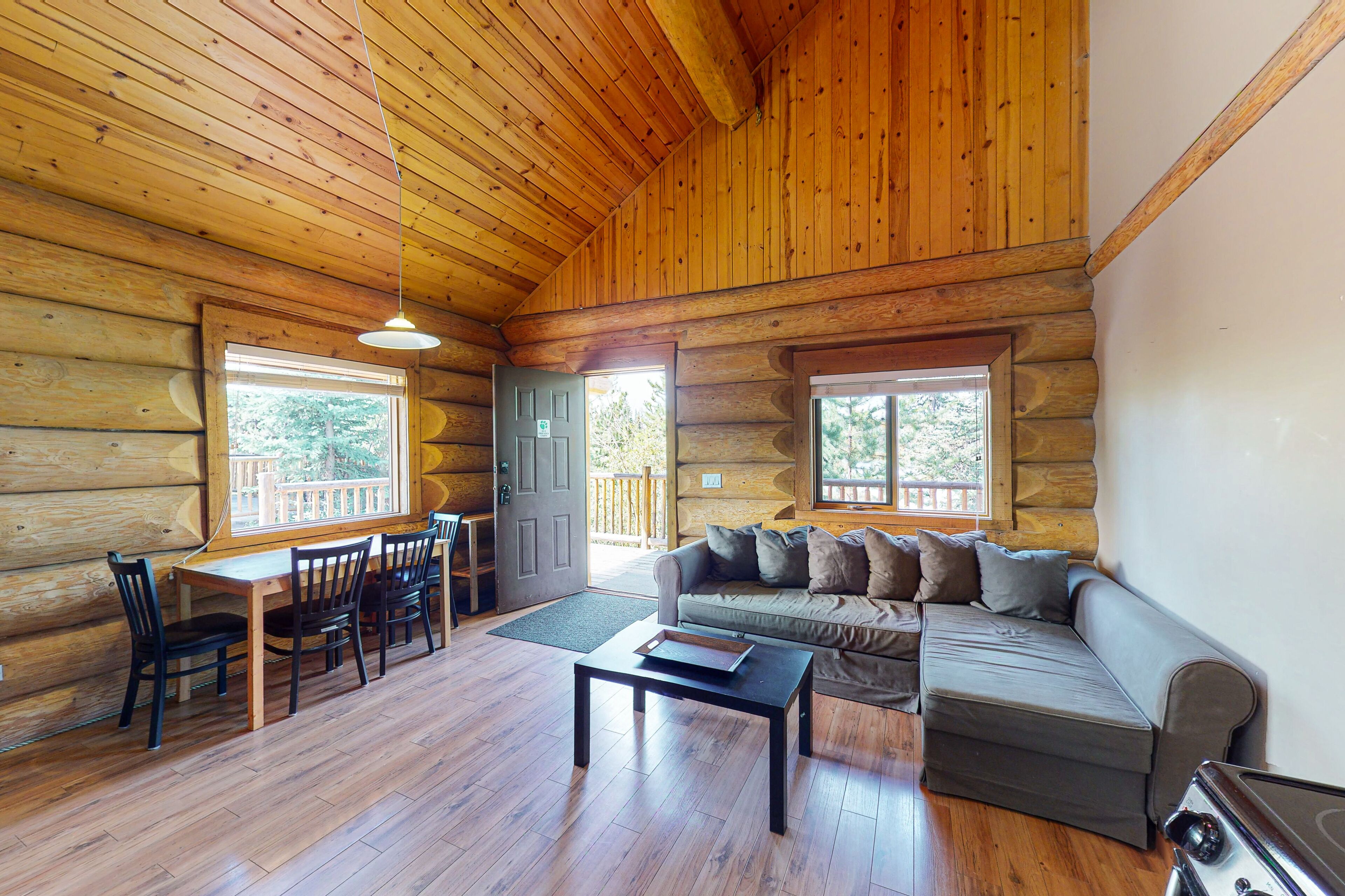 Dog-friendly lakefront wilderness resort cabin with deck, WiFi, & full kitchen