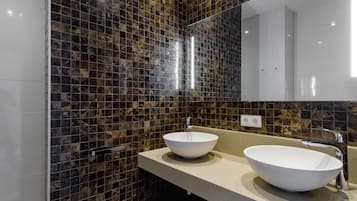 Shower, towels, toilet paper