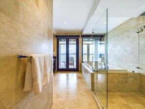 Shower, hair dryer, towels, shampoo