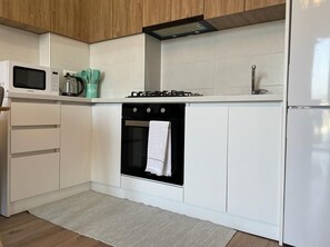 Fridge, microwave, oven, stovetop - MK Lovely Apartment for Couples or Solo Traveler (T'bilisi)