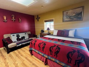 Tabla de planchar con plancha, wifi gratis y ropa de cama