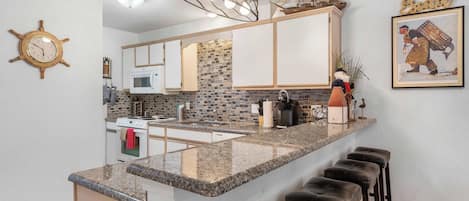 Condo, Multiple Beds, Balcony, Garden View (Nantucket at the Pointe) | Private kitchen | Coffee/tea maker