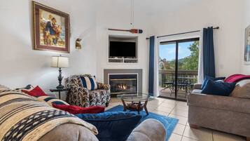 Condo, Multiple Beds, Balcony, Garden View (Nantucket at the Pointe) | Living area | 42-inch flat-screen TV with digital channels, fireplace