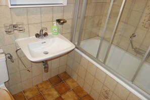 Bañera, secador de pelo