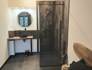 Bathtub, hair dryer, toilet paper